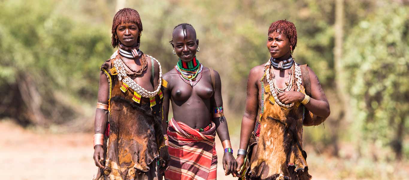 Ethiopia culture tours slide showing Hamer women in South Omo Valley