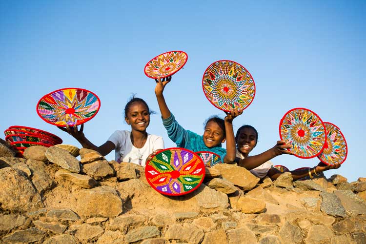 Ethiopia travel tours photo of children selling baskets in Lalibela