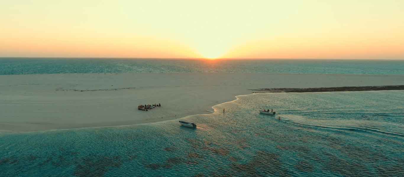 Rowley Shoals diving photo of sundowners on beach