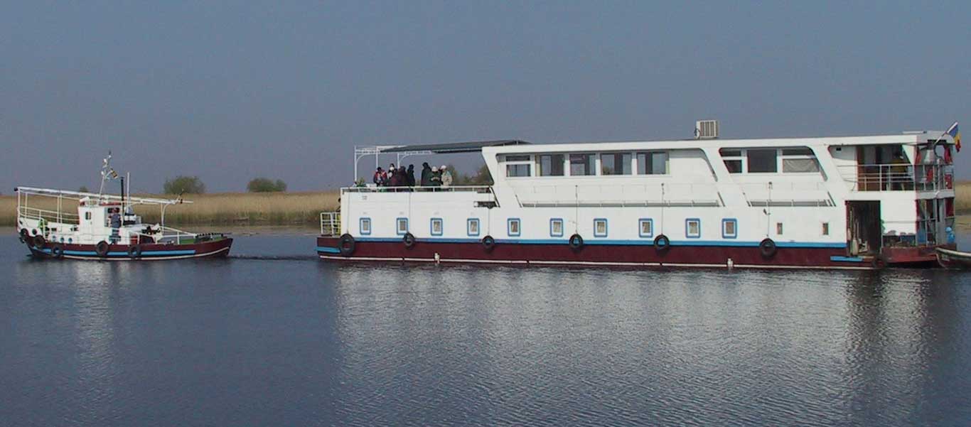 Romania wildlife tour photo of house boat on Danube Delta.
