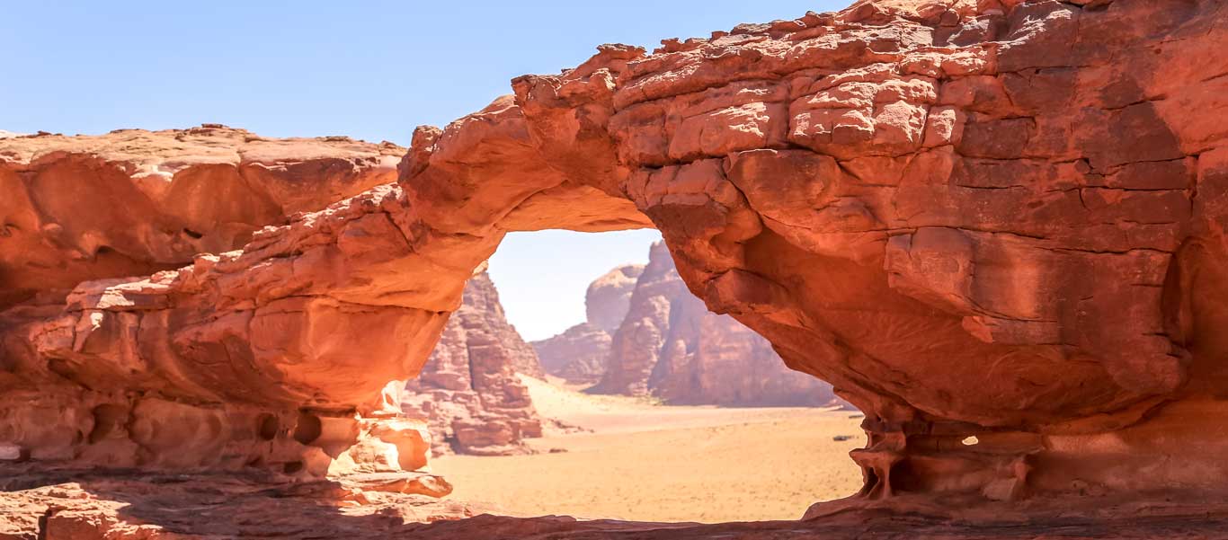 Jordan travel image of arch at Wadi Rum