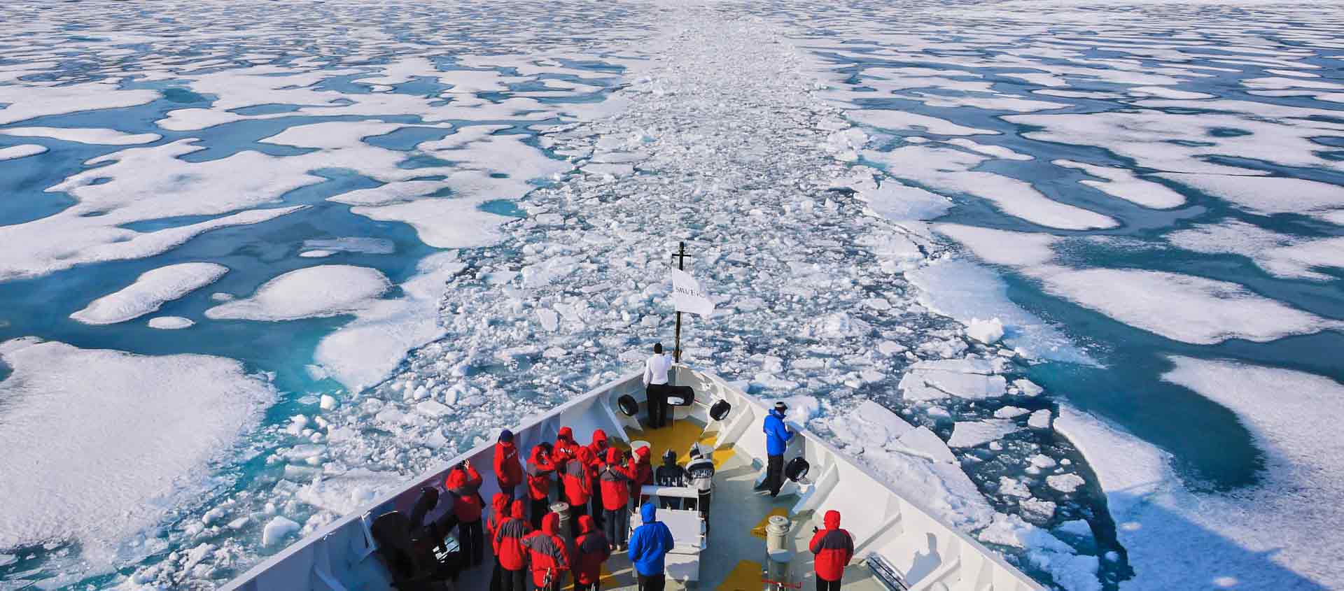 Northwest passage cruise of vessel bow in ice field